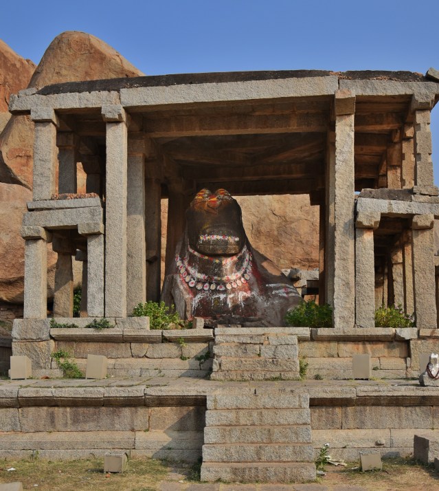 Monolithic Couchant Bull inside a Double storeyed house - Eduru Basavanna