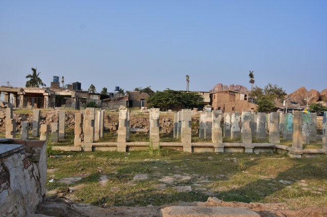 View of Ancient Hampi bazaar in front and modern Hampi bazaar in Back