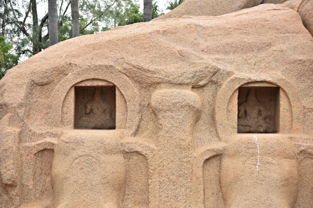 DSC_9631 - Smaller cells on the side of Tiger cave,with elephant heads carved beneath them.