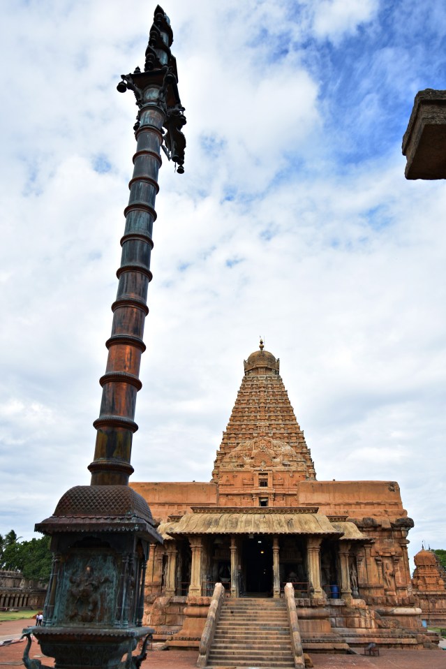 DSC_0298 - Copper made flag post and Enormous Brihadeeswara temple - View from Nandi hall.