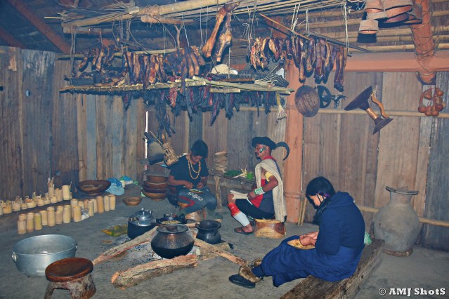 DSC_1401 Kitchen inside Chakhesang morung with hanging smoked porks.