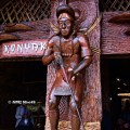 DSC_1454 Wooden sculpture of Konyak tribal hunter with gun.