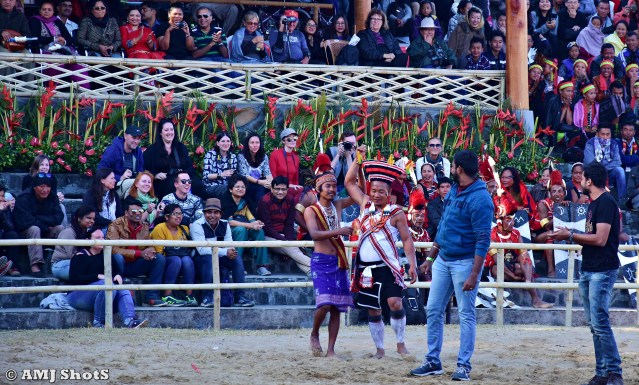 DSC_2245 Garo man congratulating the Zeliang man for winning the Ro'ong Dea challenge.
