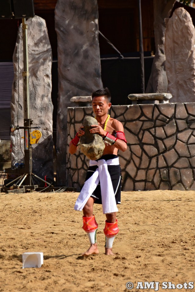 DSC_3098 Neiyie TSupre - Test of strength and maturity for youth, showing by Angami Man.