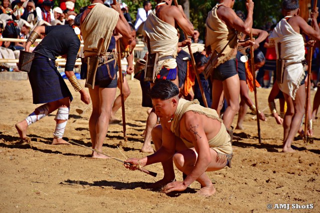 DSC_3542 Leh Leh - Khiamniungans showing their way of tilling up the agri fields and sowing seeds.